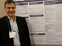 Dr. Marcelo Lancman standing next to his poster on Vimpat
