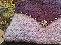 Beautiful purple knitted purse