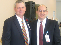 Joseph F. Scott, President and CEO of Liberty Health and Dr. Fertig