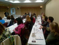 Child Epileptologist speaks to a full room on Autism and epilepsy